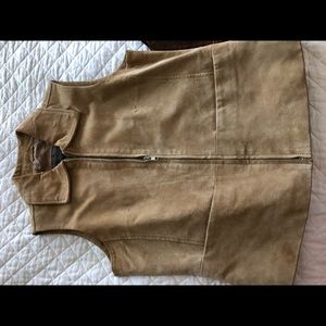 Two leather vests one fitted and lined